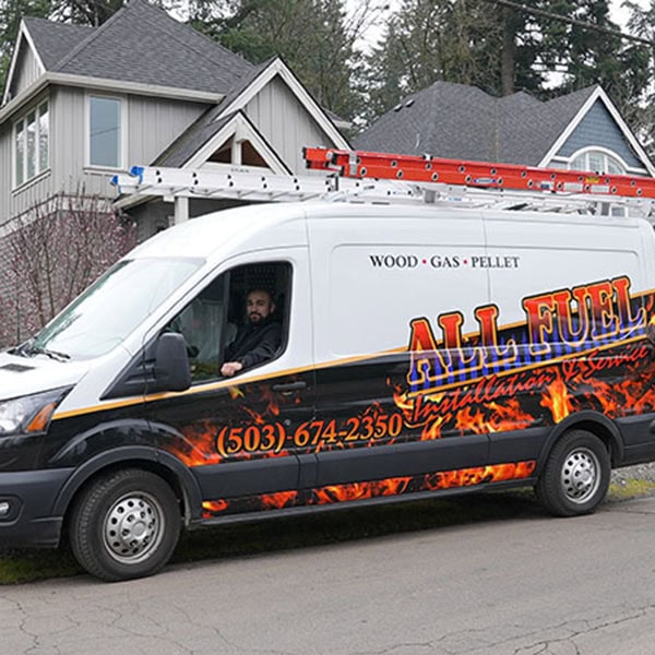 Technician working on repairing an HVAC system.