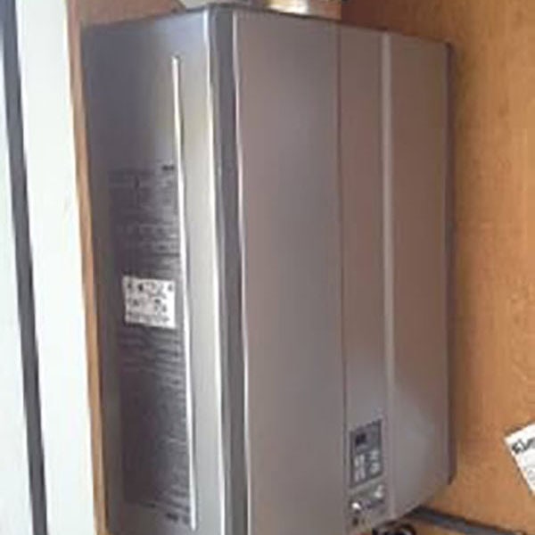 Tankless water heater installed in a home.
